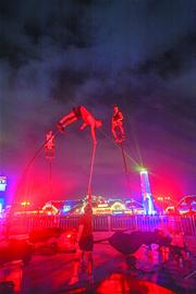 打酒机器人就位 只待啤酒城开喝