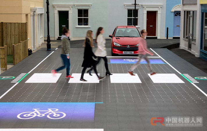 这个酷炫的智能交叉路口，可以把横穿马路的斑马线直接收起