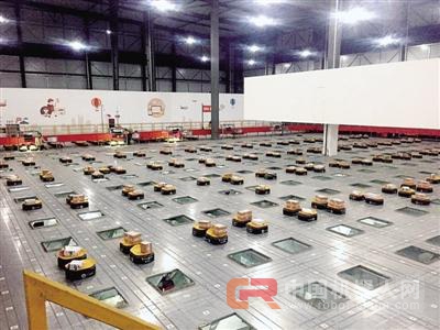 快递太多怎么办？机器人上阵分拣